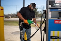 Rogelio Guerrero, 502d Logistics Readiness Squadron Fuels Flight quality assurance specialist, draws a diesel fuel sample for inspection at Chapman Training Annex, Joint Base San Antonio-Lackland, Texas, Jan. 6, 2026. Fuels personnel conduct visual sampling every 45 days to check for water or sediment and ensure fuel quality at service stations across JBSA. (U.S. Air Force photo by Jonathan R. Mallard)