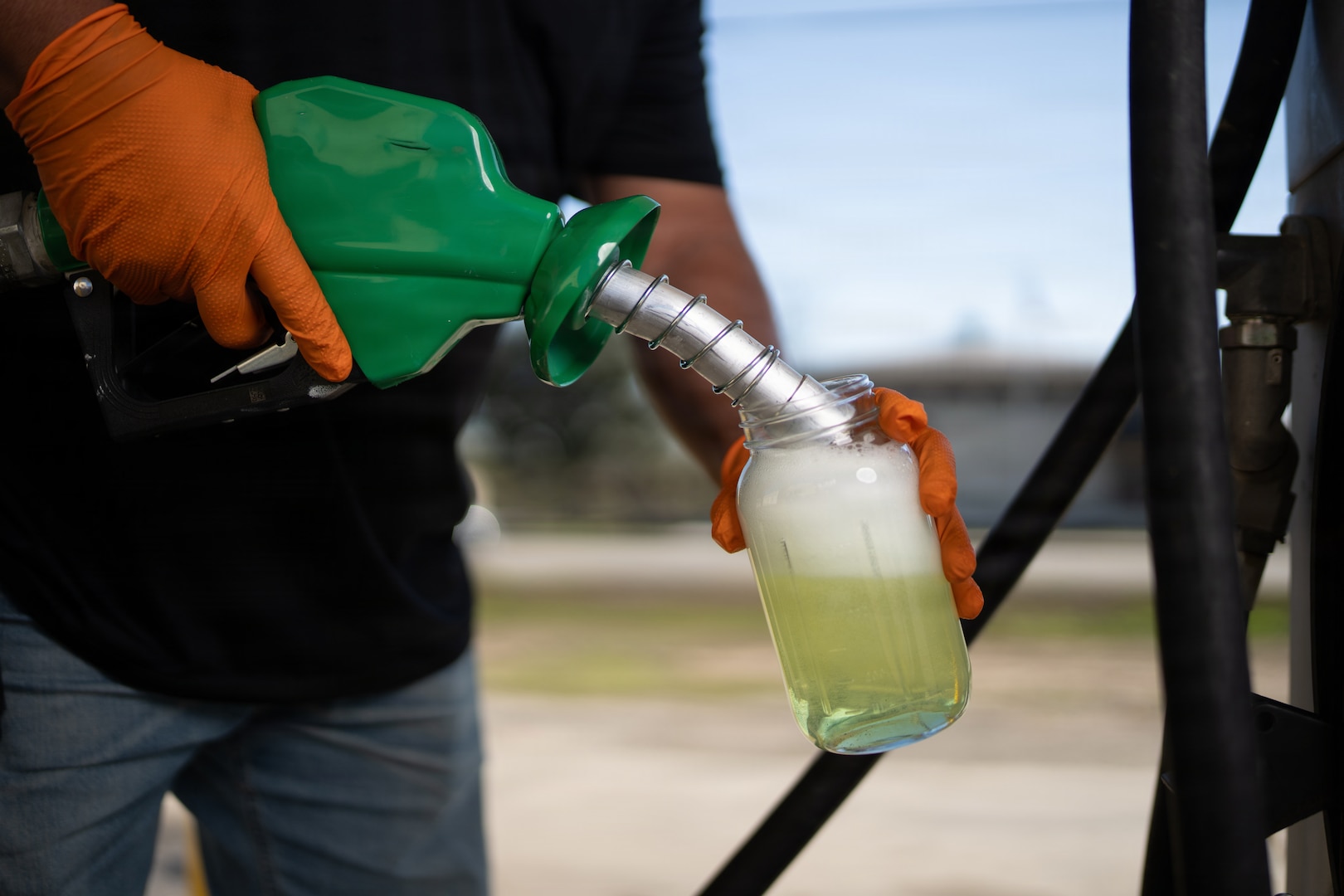 A diesel fuel sample is collected during a routine visual inspection at Chapman Training Annex, Joint Base San Antonio-Lackland, Texas, Jan. 6, 2026. The 502d Logistics Readiness Squadron Fuels Flight performs recurring field tests to ensure fuel is free of water and sediment before it reaches mission-essential vehicles and equipment. (U.S. Air Force photo by Jonathan R. Mallard)