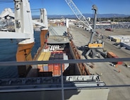 Cargo is loaded onto the Military Sealift Command chartered heavy lift ship Plantijngracht, in preparation for delivery to the remote Antarctica outpost of McMurdo Station, in support of the annual resupply mission; Operation Deep Freeze 2026.