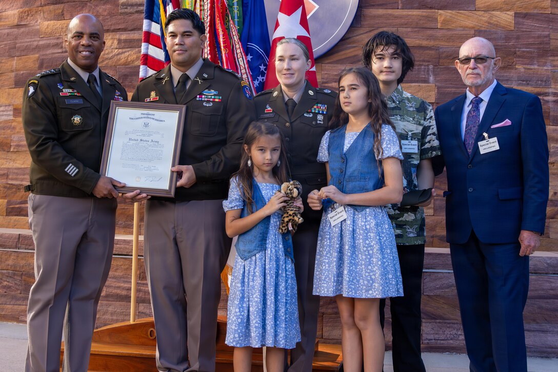 .S. Army Cpt. Jeremy Chambers, of U.S. Army Pacific, celebrate a rare and powerful milestone with his family, friends, and mentors during the promotion of Cpt. Jeremy Chambers from Master Sargent to Captain, Dec. 4, 2025, Fort Shafter, Hawaii.