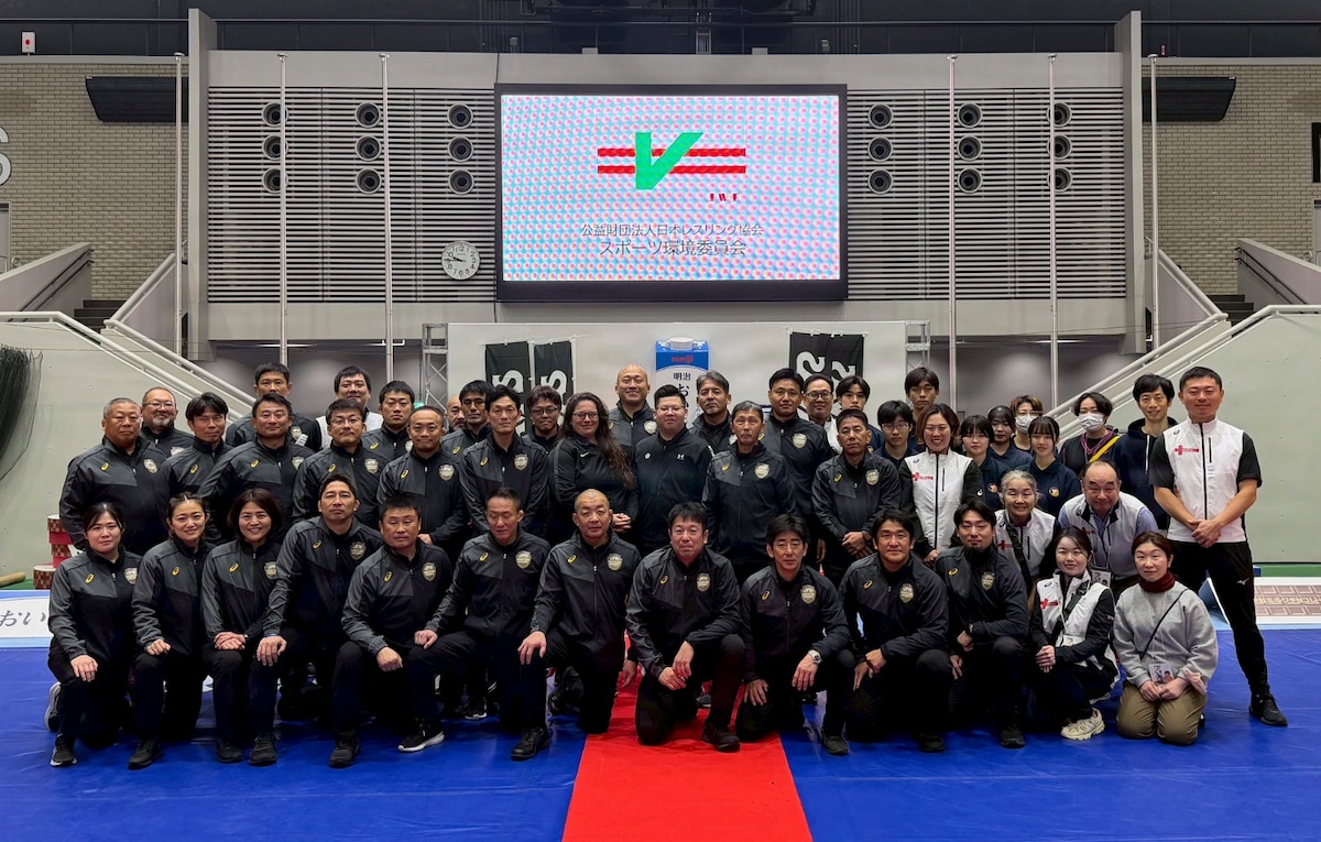 Participants and officials pose for a group photo during Japan’s national wrestling team trials at Komazawa Olympic Park, Tokyo, Japan, Dec. 18-21, 2025. The event brought together Japanese and international officials, including a member of the 35th Fighter Wing community, supporting cooperation through sport. (Courtesy photo by Laura Lopez-Cepero)