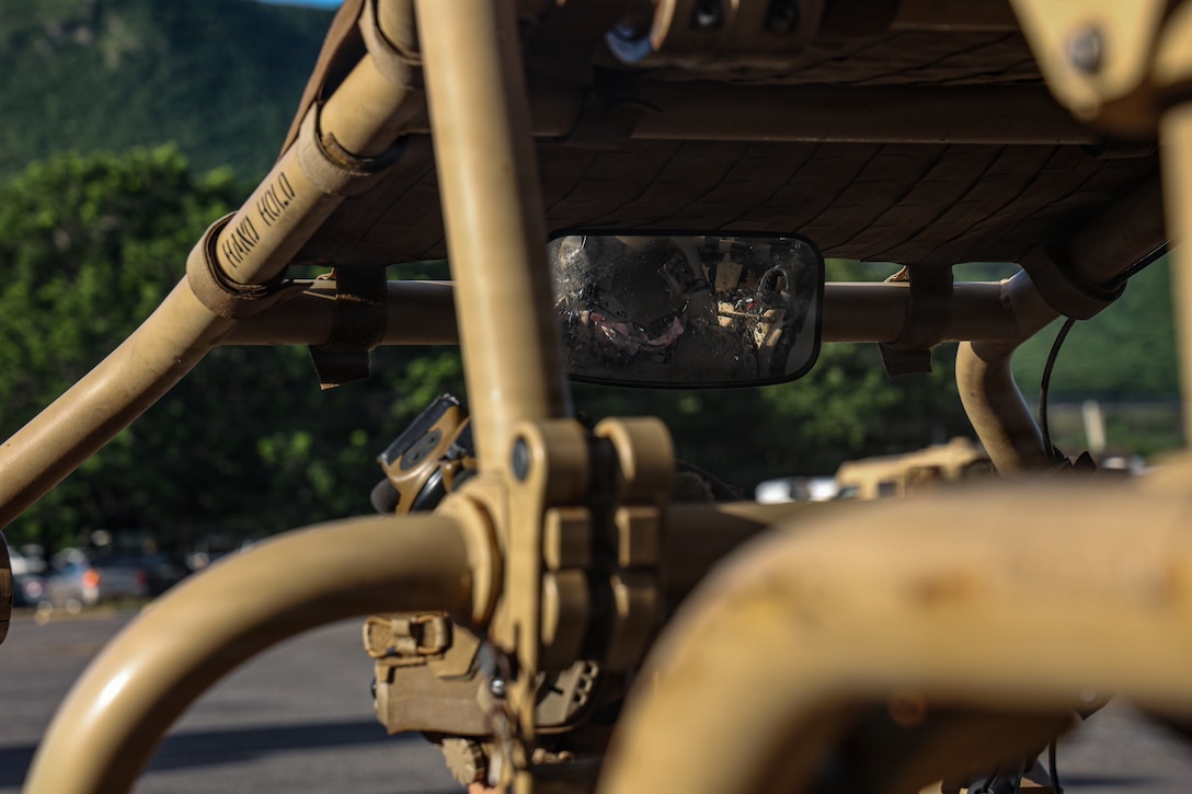 A U.S. Marine with Combat Logistics Battalion 26, 22nd Marine Expeditionary Unit (Special Operations Capable), operates a Utility Task Vehicle during convoy route reconnaissance in Camp Santiago, Puerto Rico, Dec. 10, 2025. U.S. military forces are deployed to the Caribbean in support of the U.S. Southern Command mission, Department of War-directed operations, and the president’s priorities to disrupt illicit drug trafficking and protect the homeland. (U.S. Marine Corps photo)