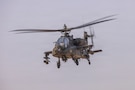 A U.S. Army AH-64D Apache assigned to Task Force Shikra (3-4 AHB), 4th Combat Aviation Brigade prepares to engage targets during Exercise Sky Shield at the Udari Range Complex, Kuwait, Dec. 5, 2025. Led by Kuwait, exercise Sky Shield included participation from the United States, Bahrain, and the United Kingdom. (U.S. Army Photo by Joe Kumzak)
