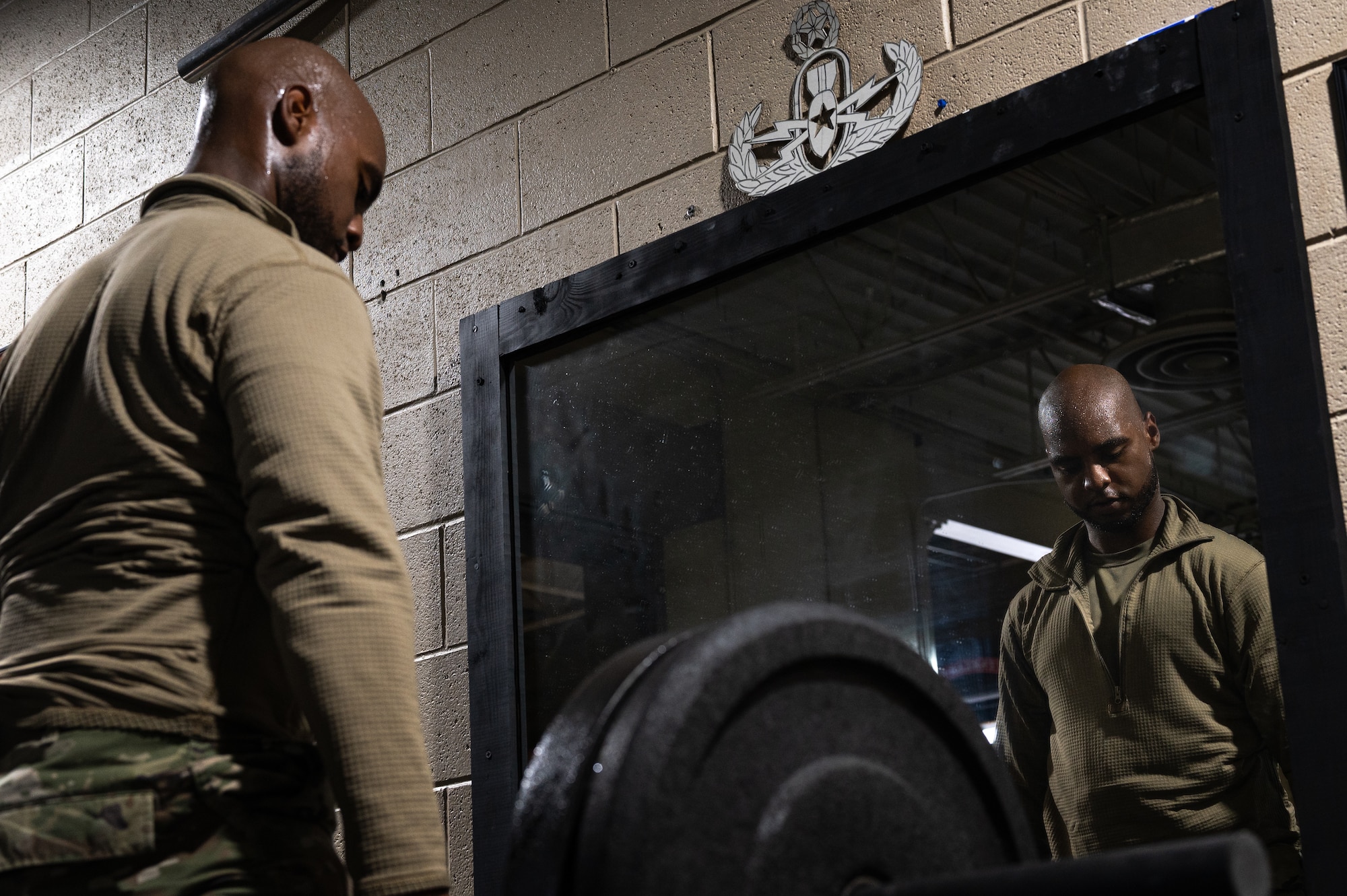 U.S. Air Force Staff Sgt. Karlton Bonty, 4th Munitions Squadron precision-guided munitions crew chief, performs the trap bar deadlift portion of an Armament Fitness Assessment (AFA) at Seymour Johnson Air Force Base, North Carolina, Oct. 8, 2025. The AFA ensures the 4th Fighter Wing’s combat capability is at its peak by testing the physical and mental limits of airmen. (U.S. Air Force photo by Airman Holly Leonard)