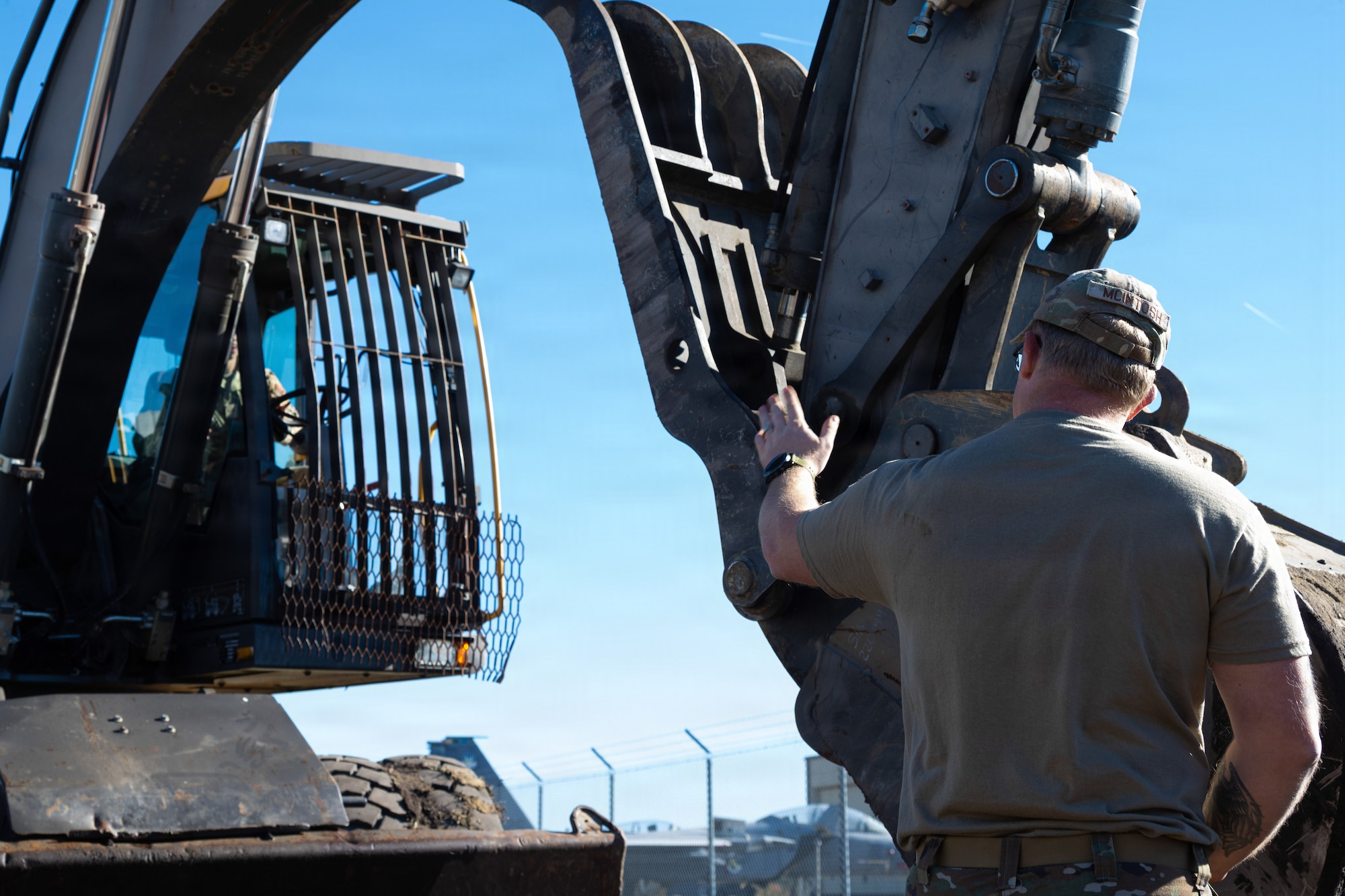 U.S. Air Force Senior Airman Benjamin Berberich, 4th Civil Engineer Squadron pavement and equipment journeyman, prepares to replace a water line at Seymour Johnson Air Force Base, North Carolina, Nov. 17, 2025. The water line replacement project introduces tougher piping that enhances both reliability and efficiency. (U.S. Air Force photo by Airman Daryl Briscoe)