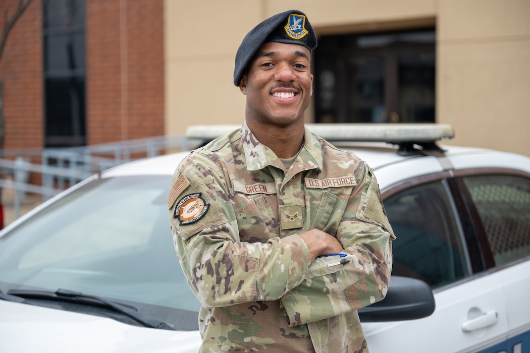 U.S. Air Force Airman 1st Class Detravion Green, 97th Security Forces Squadron (SFS) logistics supply technician, poses outside of the 97th SFS building at Altus Air Force Base, Oklahoma, Dec. 15, 2025.Green emphasizes that his biggest strength is his motivation, enabling him to perform his duties at the highest level. (U.S. Air Force photo by Airman 1st Class Nathan Langston)