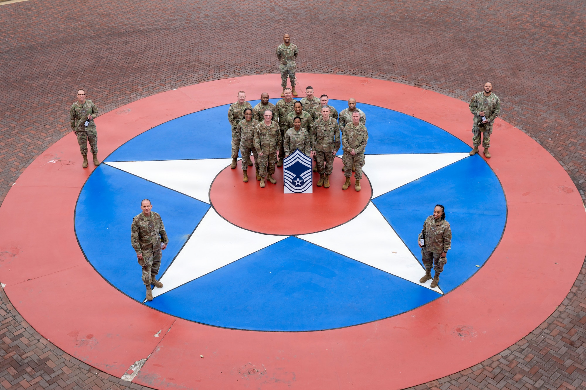 Newly selected chief master sergeants and wing leadership from Joint Base Anacostia-Bolling gather for a photo on JBAB, Washington, D.C., Jan. 6, 2026. Chief master sergeant, the highest U.S. Air Force enlisted rank, is held by just 1% of the Air Force's enlisted personnel. (U.S. Air Force photo by Hayden Hallman)
