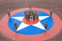 Newly selected chief master sergeants and wing leadership from Joint Base Anacostia-Bolling gather for a photo on JBAB, Washington, D.C., Jan. 6, 2026. Chief master sergeant, the highest U.S. Air Force enlisted rank, is held by just 1% of the Air Force's enlisted personnel. (U.S. Air Force photo by Hayden Hallman)