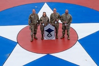 Newly selected chief master sergeants from Joint Base Anacostia-Bolling gather for a photo on JBAB, Washington, D.C., Jan. 6, 2026. Chief master sergeant, the highest U.S. Air Force enlisted rank, is held by just 1% of the Air Force's enlisted personnel. (U.S. Air Force photo by Hayden Hallman)