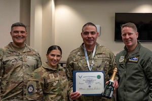 New chief poses for photo.