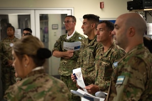 Argentine service members prepare for a flight medicine course at Davis-Monthan Air Force Base, Arizona, Jan. 6, 2026. The course supports joint training focused on the physical demands of operating fourth-generation fighter aircraft. (U.S. Air Force photo by Airman 1st Class Jaden Kidd)