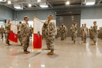 The Nevada Guard's 17th Sustainment Brigade, 17th Special Troops Battalion and 17th Headquarters and Headquarters Company command teams uncase the unit colors during an uncasing ceremony at the Speedway Armory, Jan. 8, 2026. Photo by Sgt. Adrianne Lopez.