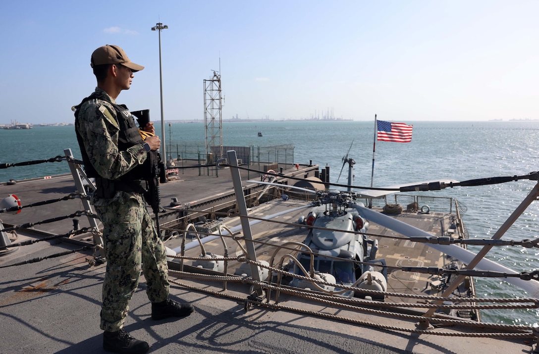 MANAMA, Bahrain (Jan. 4, 2026) U.S. Navy Sonar Technician (Surface) 2nd Class Francisco Salazar, assigned to the Arleigh Burke-class guided-missile destroyer USS Roosevelt (DDG 80), stands watch in Manama, Bahrain. Roosevelt is deployed to the U.S. 5th Fleet area of operations to support maritime security and stability in the U.S. Central Command area of responsibility. (U.S. Navy photo by Mass Communication Specialist 1st Class Indra Beaufort)