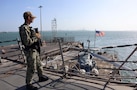 MANAMA, Bahrain (Jan. 4, 2026) U.S. Navy Sonar Technician (Surface) 2nd Class Francisco Salazar, assigned to the Arleigh Burke-class guided-missile destroyer USS Roosevelt (DDG 80), stands watch in Manama, Bahrain. Roosevelt is deployed to the U.S. 5th Fleet area of operations to support maritime security and stability in the U.S. Central Command area of responsibility. (U.S. Navy photo by Mass Communication Specialist 1st Class Indra Beaufort)