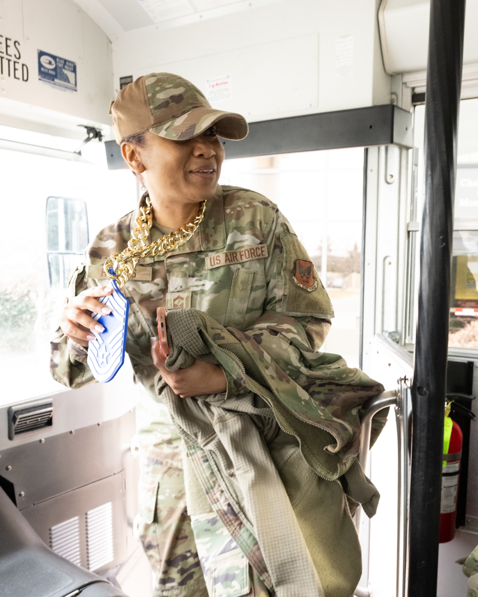 U.S. Air Force Senior Master Sgt. Ayana Hodges, Air Force Mortuary Affairs Operations programs and plans division superintendent, joins members of Team Dover leadership, Chief Master Sgts. and fellow promotion selectees as they travel to a reception at Dover Air Force Base, Delaware, Jan. 6, 2026. Hodges was one of nine Senior Master Sgts. at Dover AFB selected for promotion to the rank of Chief Master Sgt. (U.S. Air Force photo by Mauricio Campino)