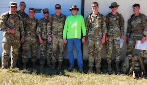 David Sample, center, 82nd Training Group, prepares to conduct training at the U.S. Air Force Academy in Colorado