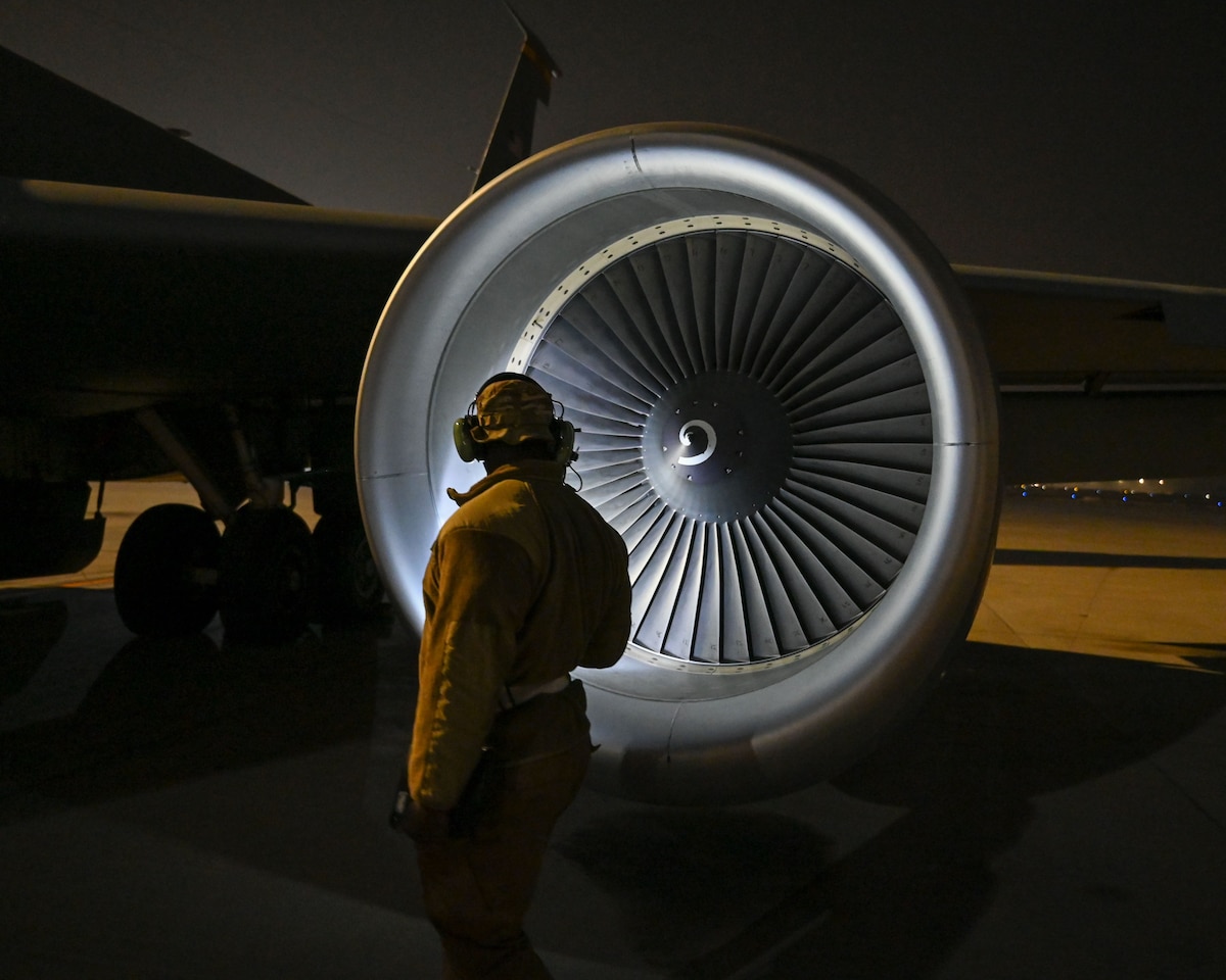 A crew chief assigned to the 174th Expeditionary Aircraft Maintenance Squadron conducts a pre-mission inspection on a KC-135 Stratotanker at a base in the U.S. Central Command area of responsibility, Dec. 19, 2025. The inspection ensures the aircraft is mission-ready to support aerial refueling operations critical to regional airpower and coalition missions. (U.S. Air Force photo)