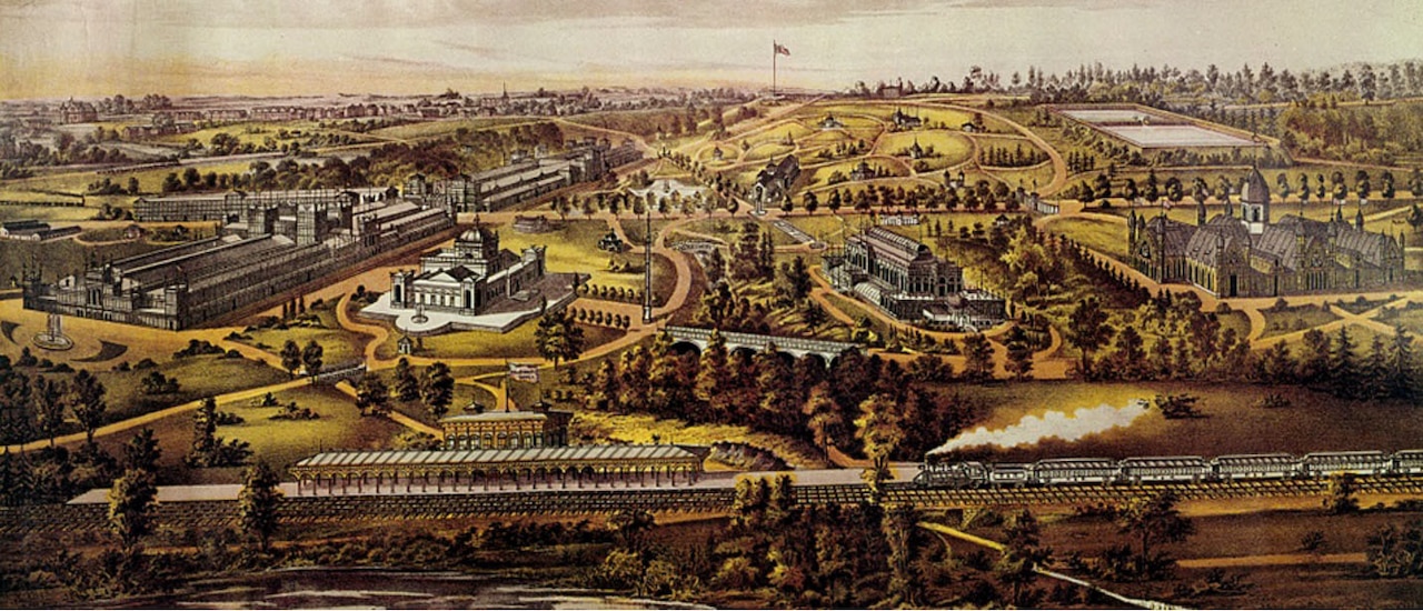 A poster shows an aerial view of an exposition with a variety of buildings.