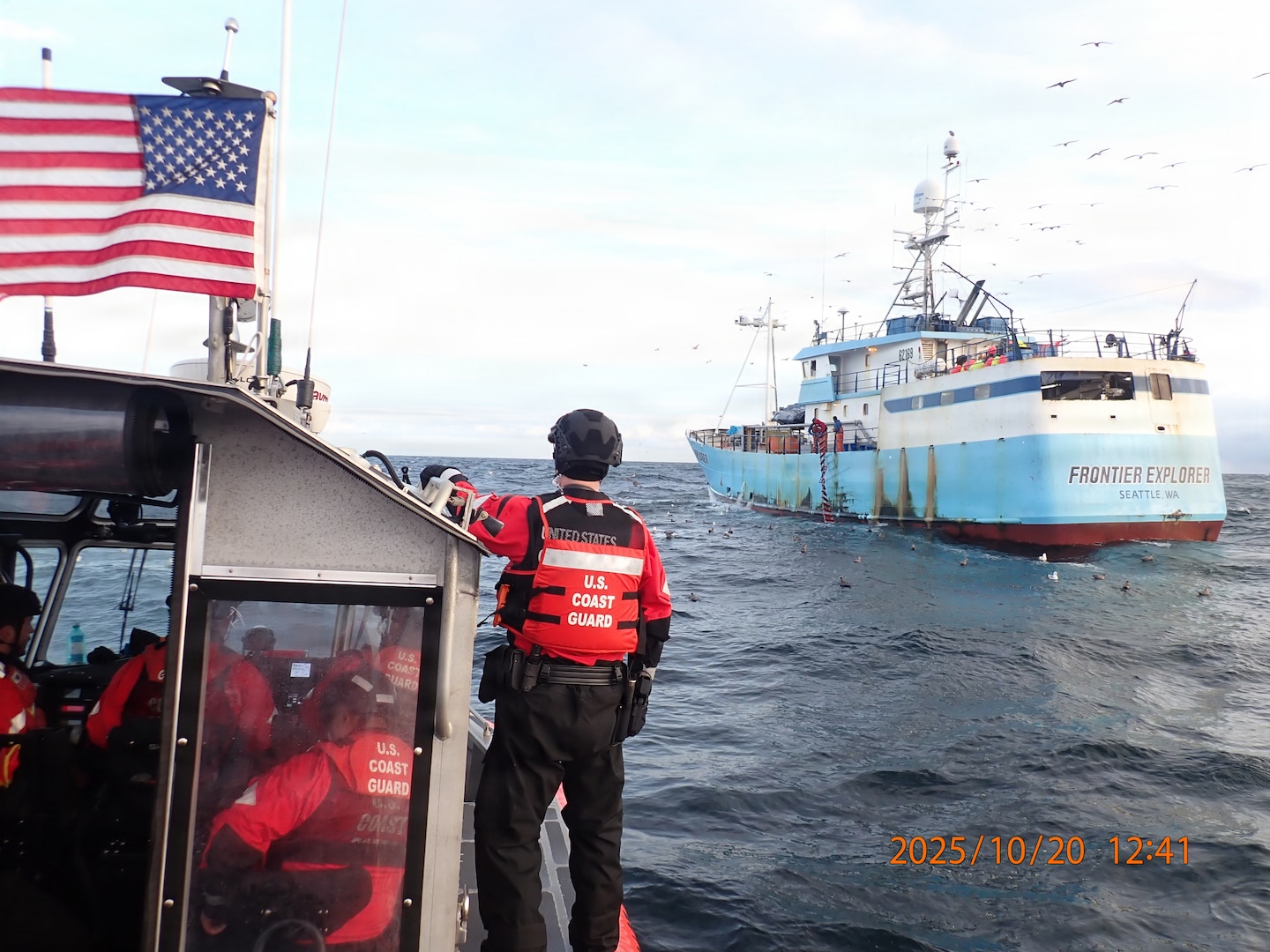 A U.S. Coast Guard law enforcement boarding team from USCGC Kimball (WMSL 756) approaches the fishing vessel Frontier Explorer for a fisheries boarding in the Bering Sea, Oct. 20, 2025. The team was deployed from a 35-foot Long Range Interceptor II cutter boat to conduct inspections and ensure compliance with federal fisheries regulations. (U.S. Coast Guard photo by Petty Officer 1st Class Michael Maust)