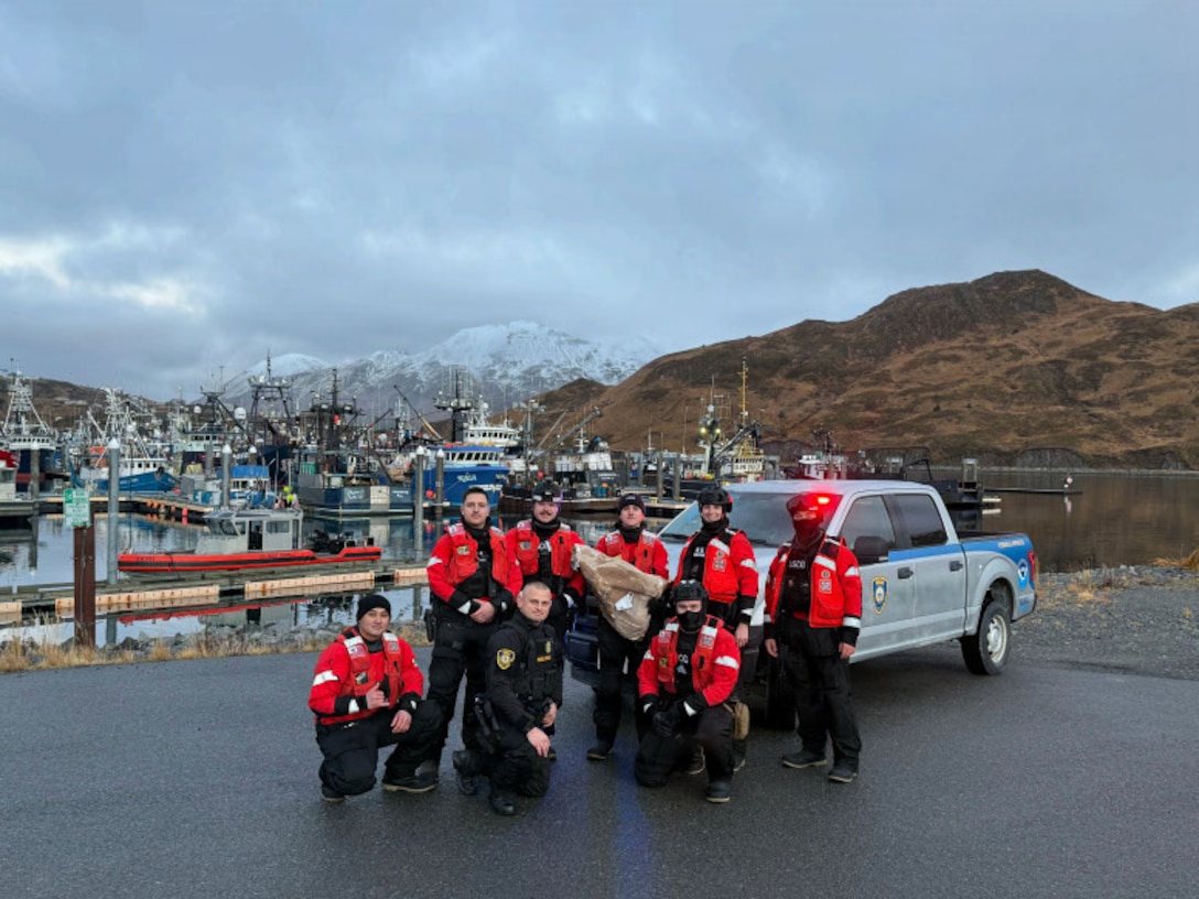U.S. Coast Guard members from USCGC Kimball (WMSL 756) and agents from NOAA’s Office of Law Enforcement conduct a joint boarding of the cargo vessel NO. 2 POHAH in Summer’s Bay, Alaska, Nov. 26, 2025. The boarding resulted in the identification of a violation for possession of approximately 30 pounds of undocumented Atka mackerel, reinforcing interagency efforts to enforce U.S. laws. (U.S. Coast Guard photo by Lt. j.g. Owen Trent.)