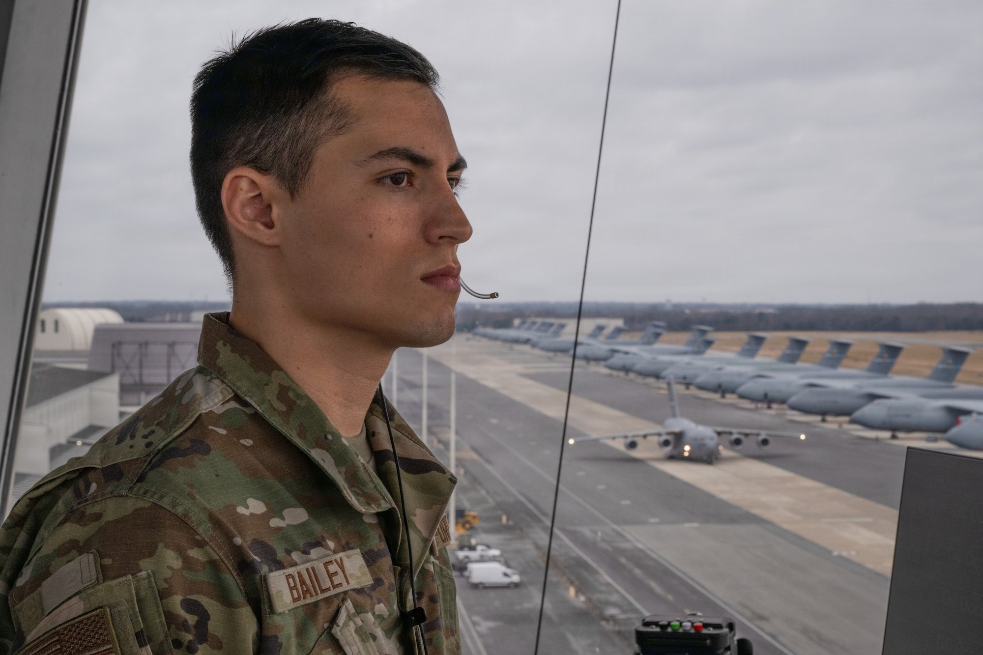 U.S. Airman Jordan Bailey, 436th Operational Support Squadron Air Traffic Control tower apprentice, clears a C-17 Globemaster III for taxiing at Dover Air Force Base, Delaware, Dec. 29, 2025. Controllers at Dover AFB work with a wide variety of aircraft, including the C-17 Globemaster III and the C-5M Super Galaxy.