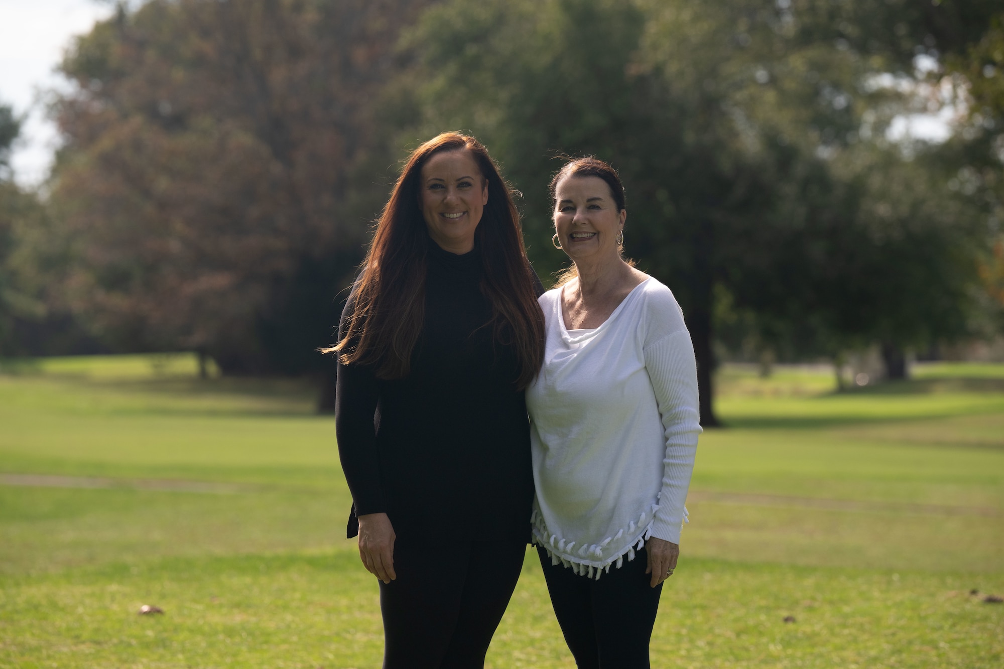 Leslie Estabrook, left, 436th Force Support Squadron recreation aide, and Carol Minor, Leslie’s mother, pose for a photo at Eagle Creek Golf Course on Dover Air Force Base, Delaware, Oct. 15, 2025. Leslie and Carol are descendants of the Lissys, a family who lived and worked on the land before it was bought and turned into a golf course. (U.S. Air Force photo by Airman 1st Class Liberty Kuhn)
