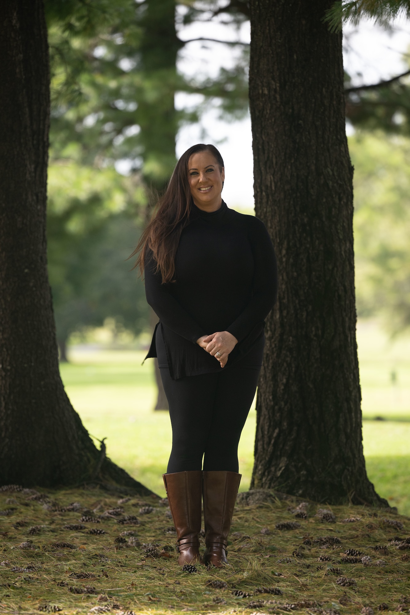 Leslie Estabrook, 436th Force Support Squadron recreation aide, poses for a photo at the Eagle Creek Golf Course on Dover Air Force Base, Delaware, Oct. 15, 2025. Leslie is the granddaughter of the Lissy family, who lived and worked on the land before the Air Force bought it in 1959. (U.S. Air Force photo by Airman 1st Class Liberty Kuhn)