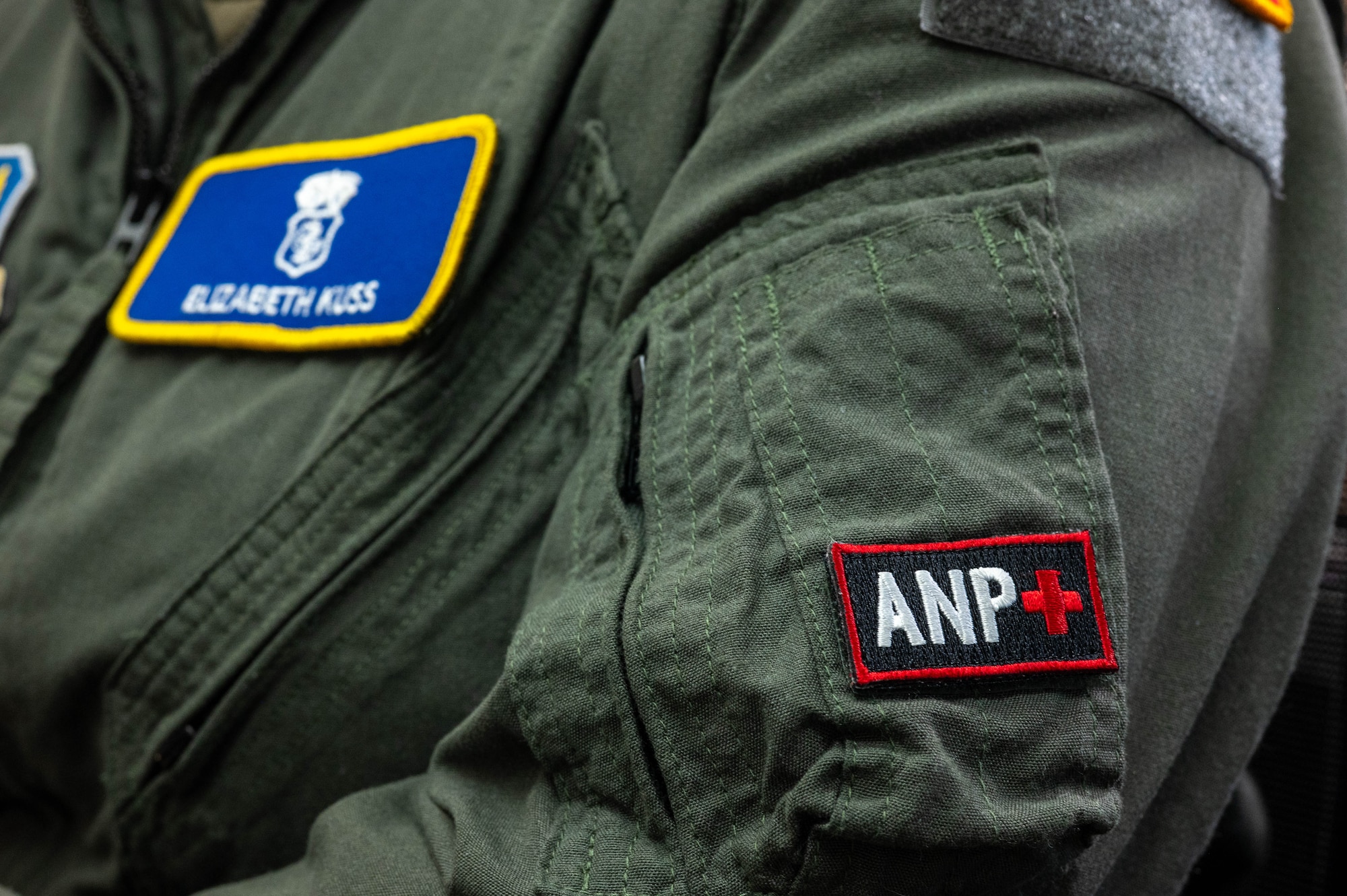 U.S. Air Force Maj. Elizabeth Kuss, 325th Operational Medical Readiness Squadron flight medicine flight commander, wears her aeromedical nurse practitioner patch at Tyndall Air Force Base.