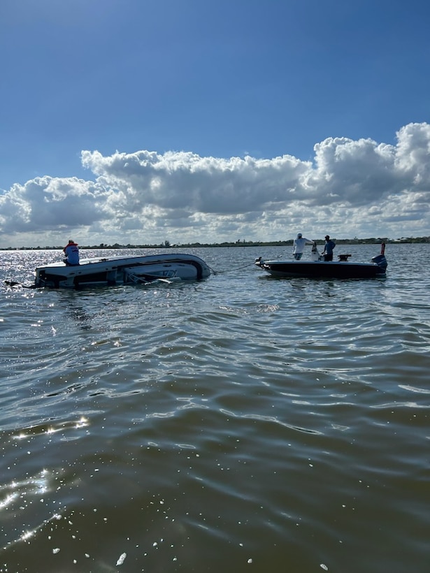 A Coast Guard Station Port Canaveral boat crew rescues a person after their 24-foot vessel capsized on the Banana River near Kelly Park in Port Canaveral, Florida, Jan. 10, 2026.