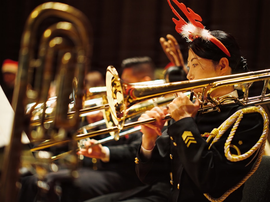 A Japan Maritime Self-Defense Force musician assigned to the JMSDF Band Yokosuka performs at the "All Hands for the Holidays: A Joint Celebration Concert" Sunday, December 14 at Commander, Fleet Activities Yokosuka's Fleet Theater.