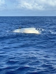 A 58-year-old mariner survives a vessel capsizing west of Guam on Jan. 12, 2026, thanks to his use of multiple communication devices, staying with the vessel, and informing others of his plans, which enabled a rapid U.S. Coast Guard response. The mariner departed Merizo around 5 a.m. local time aboard the 22-foot white pleasure boat Solo 2 to fish near the Agat buoy and then head to the 9-mile mark. Adverse sea conditions, including a high surf advisory and a rip current statement, are currently in effect for Guam and likely contributed to the vessel capsizing. (U.S. Coast Guard photo by Station Apra Harbor)