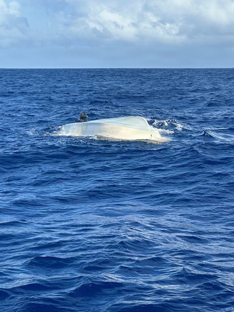 A 58-year-old mariner survives a vessel capsizing west of Guam on Jan. 12, 2026, thanks to his use of multiple communication devices, staying with the vessel, and informing others of his plans, which enabled a rapid U.S. Coast Guard response. The mariner departed Merizo around 5 a.m. local time aboard the 22-foot white pleasure boat Solo 2 to fish near the Agat buoy and then head to the 9-mile mark. Adverse sea conditions, including a high surf advisory and a rip current statement, are currently in effect for Guam and likely contributed to the vessel capsizing. (U.S. Coast Guard photo by Station Apra Harbor)