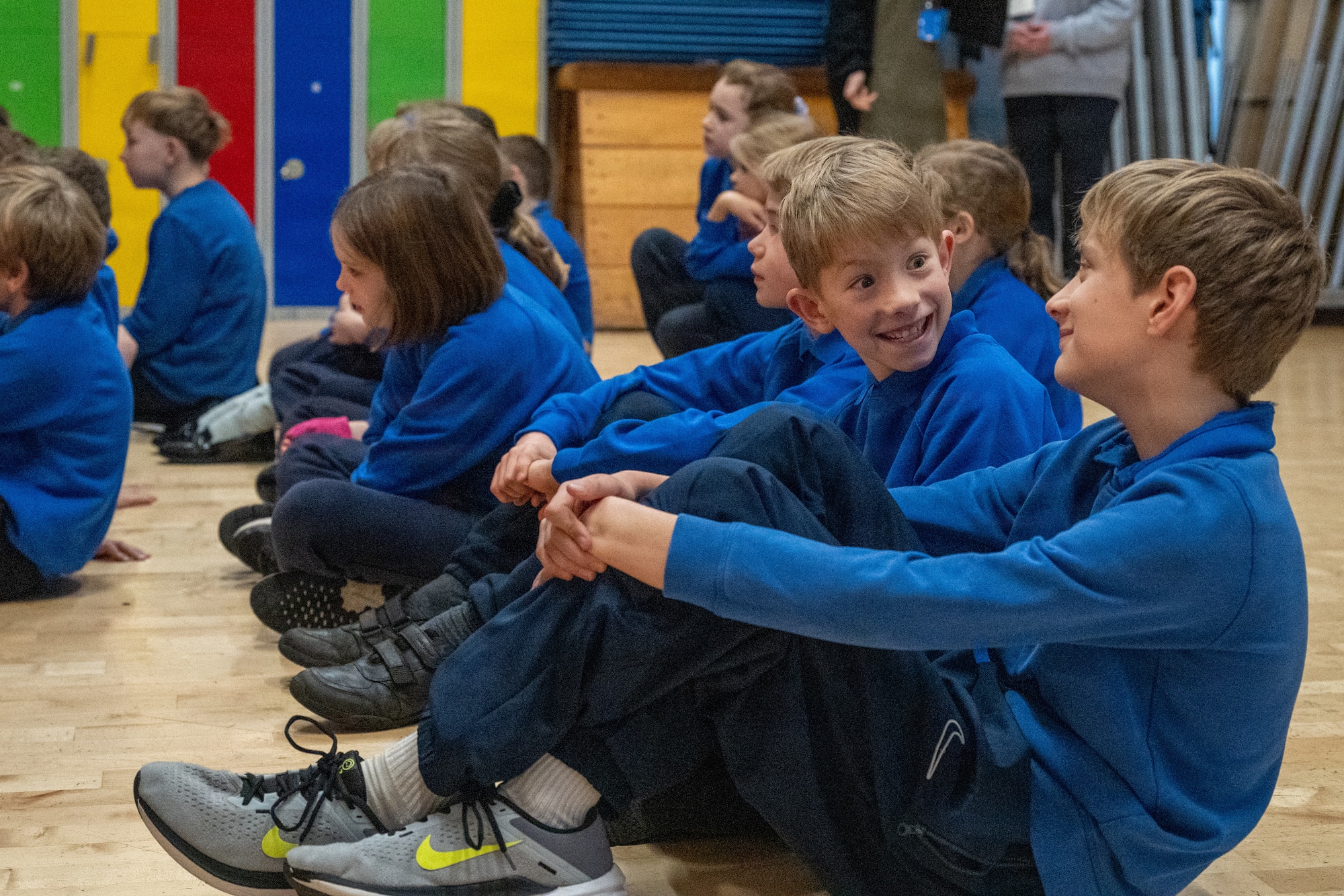 Children smile during a visit with Santa Claus