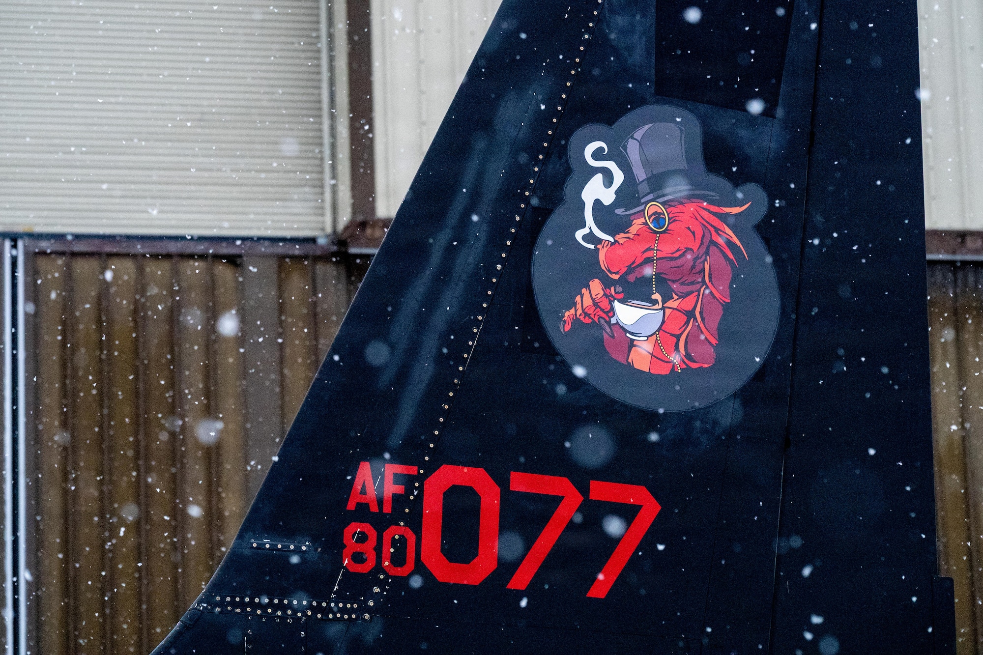 A squadron emblem is displayed on the tail of a U-2 Dragon Lady aircraft