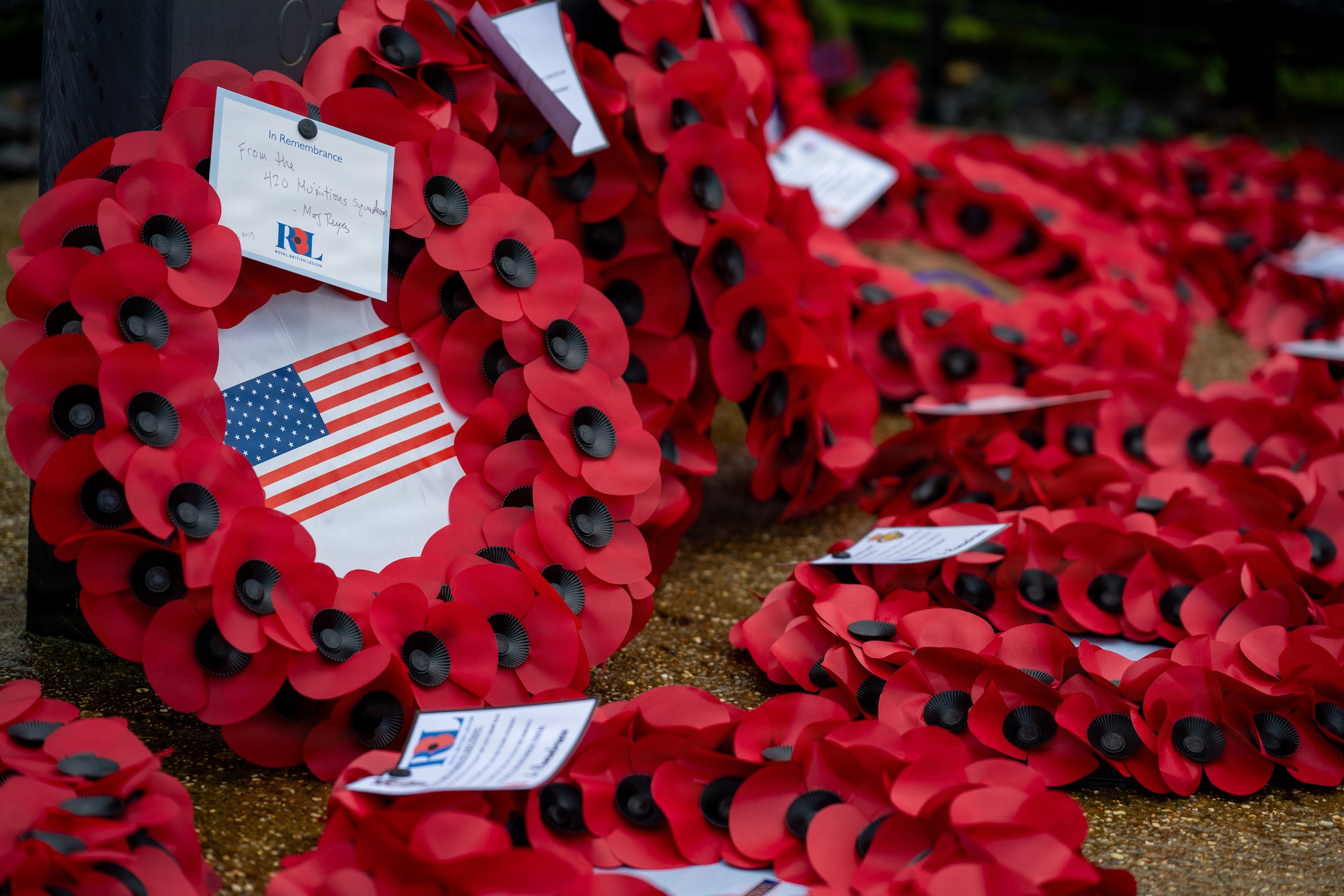 Wreaths honoring fallen U.S. servicemen rest during a memorial service