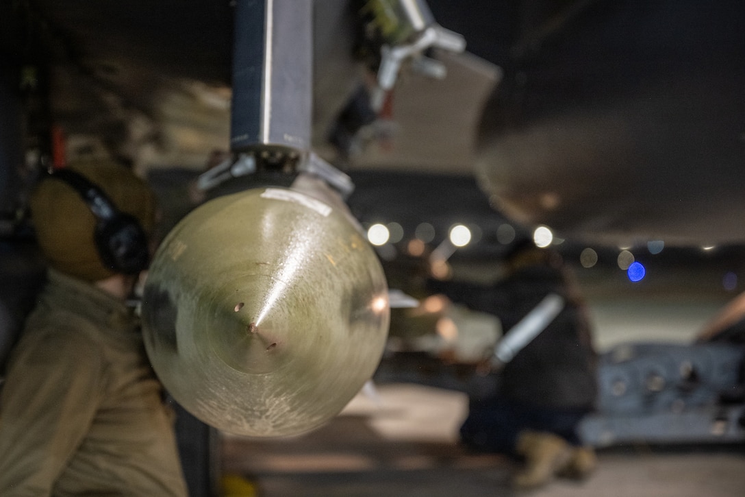 U.S. CENTRAL COMMAND AREA OF RESPONSIBILITY (Jan. 10, 2026) U.S. Airmen load bombs onto F-15E Strike Eagles in the U.S. Central Command area of responsibility in support of Operation Hawkeye Strike, Jan. 10, 2026. (U.S. Air Force Photo)