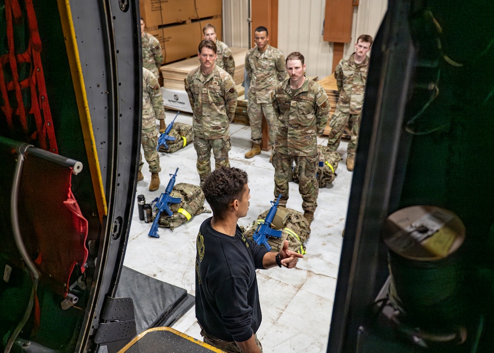 U.S. Air Force Capt. Luke Thomas, 23d Combat Air Base Squadron assistant director of operations, instructs Airmen assigned to the 23d CABS at Moody Air Force Base, Georgia, Jan. 7, 2026. The brief provided guidance and information before the second day of the assessment conducted to prepare volunteers for the physical demands of the Army Air Assault Course. (U.S. Air Force photo by Senior Airman Leonid Soubbotine)
