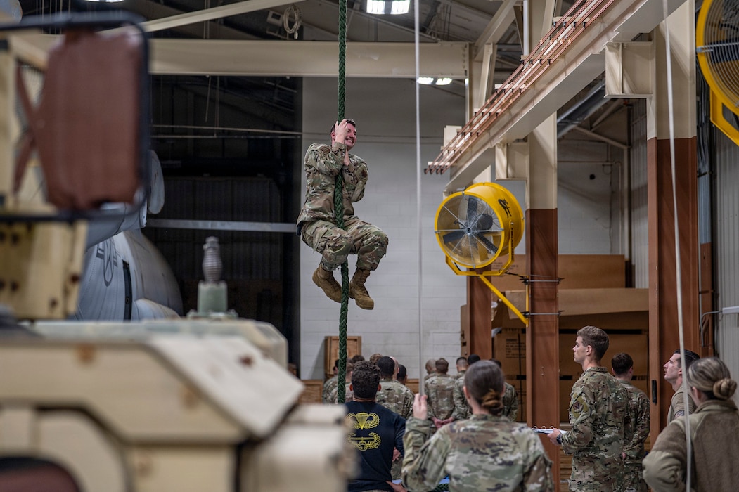 A U.S. Air Force Airman assigned to the 23d Combat Air Base Squadron attempts to climb a rope at Moody Air Force Base, Georgia, Jan. 7, 2026. The rope climb is a required event used to screen candidates for the Army Air Assault Course, known for its physically demanding training environment. (U.S. Air Force photo by Senior Airman Leonid Soubbotine)