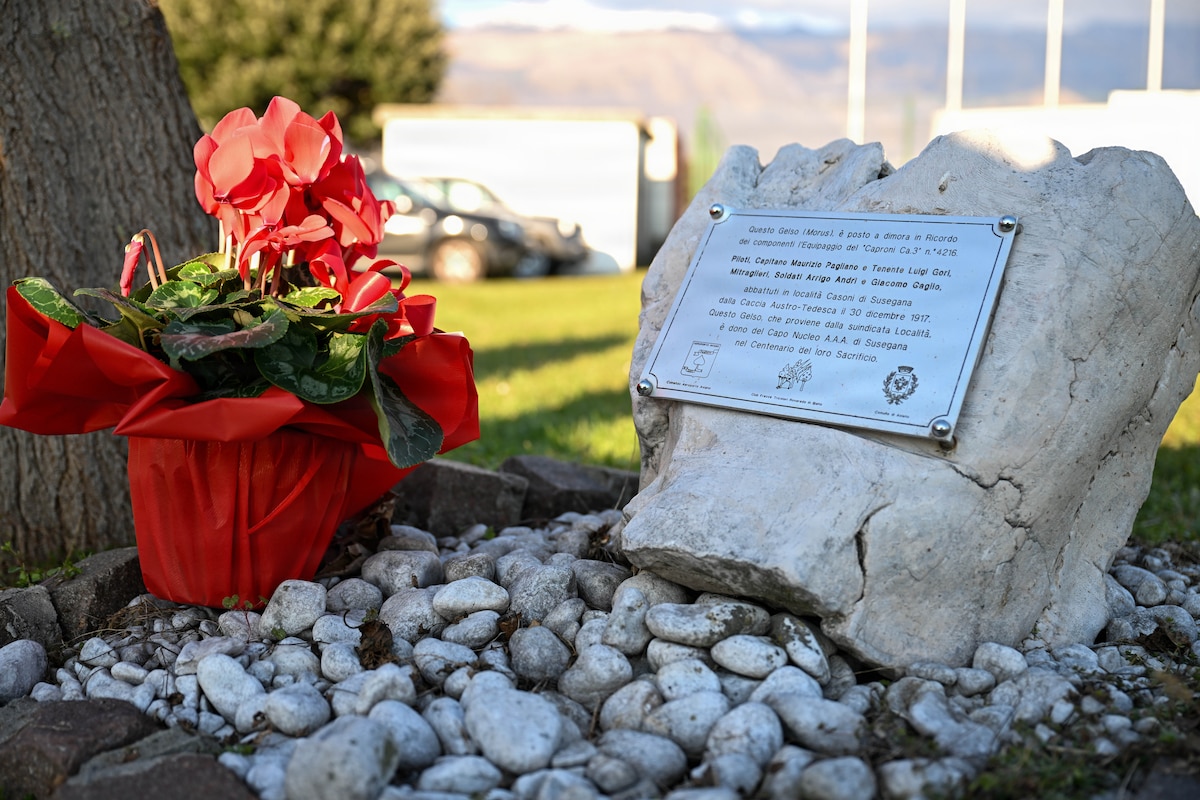 Memorial stone and flowers