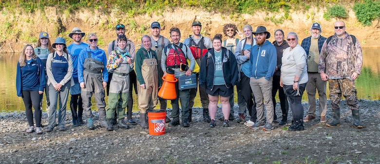 Partnering agencies gather for a group photo during the mussel reintroduction project.