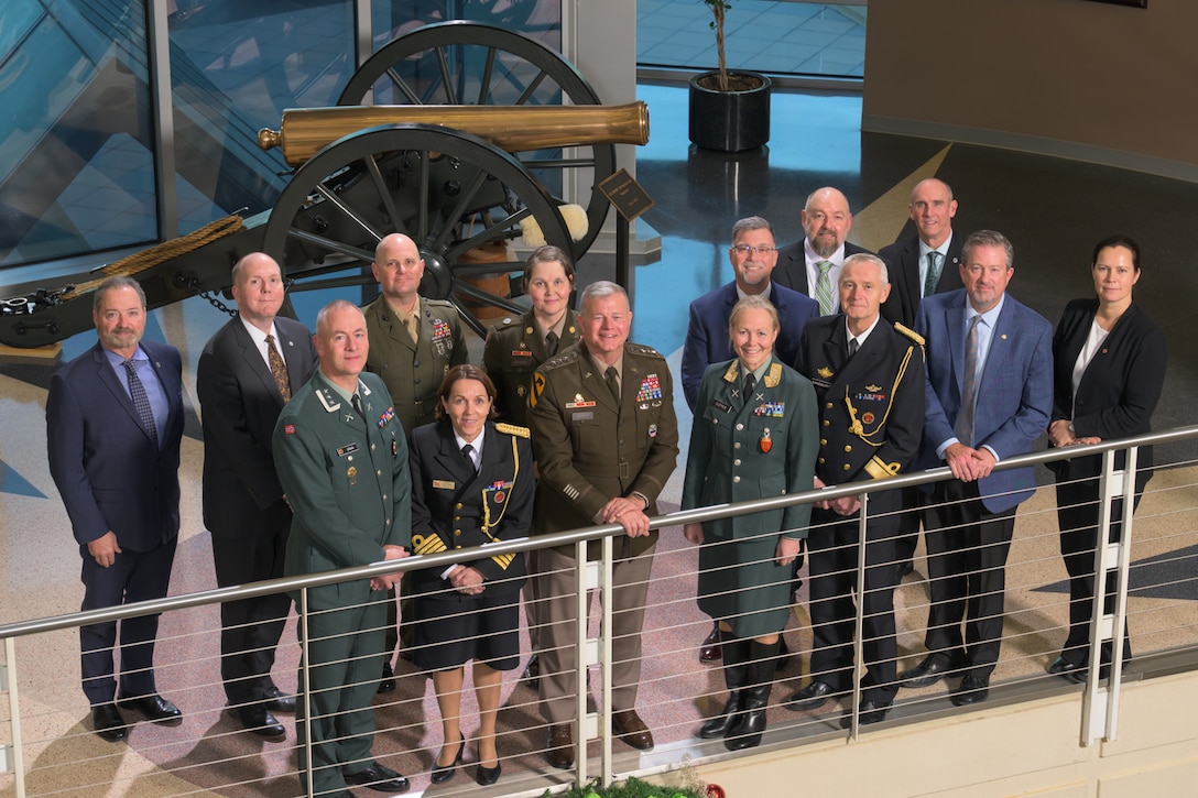 A group of military leaders from the United States and Norway stand in a group.