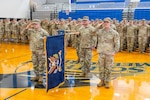 Lt. Col. Joshua Rapp, left, commander of the 1st Battalion, 186th Infantry Regiment, and Command Sgt. Maj. Evan Garner render honors during the national anthem at a demobilization ceremony at South Medford High School in Medford, Oregon, Jan. 11, 2026. The battalion returned in October from a nine-month deployment to Egypt's Sinai Peninsula, where the battalion members served as USBATT 74 with the Multinational Force and Observers mission. Photo by Maj. W. Chris Clyne.