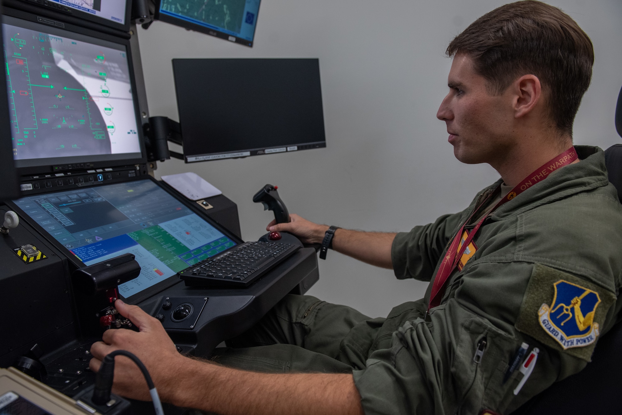U.S. Air Force Senior Airman Nathan Colburn, 482nd Attack Squadron sensor operator instructor, operates an MQ-9 Reaper from a Ground Control Station at Shaw Air Force Base, S.C., Oct. 20, 2025.