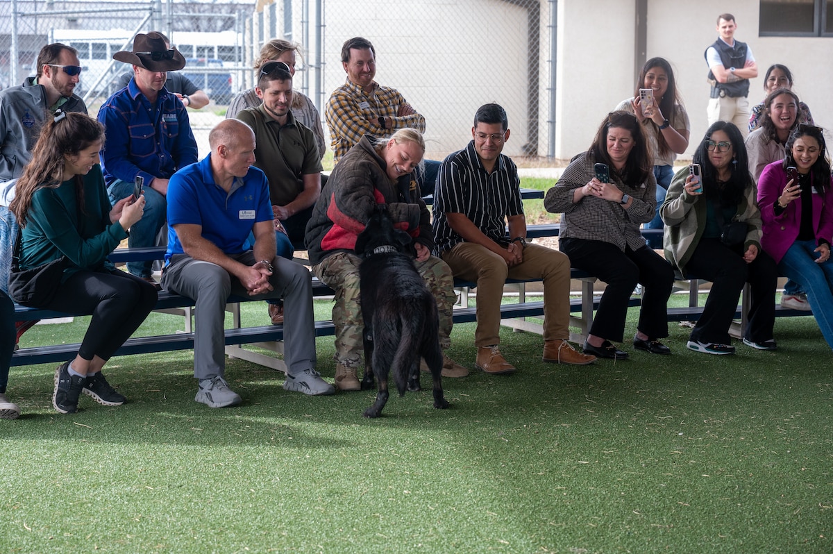 Members of the Leadership San Angelo Class of 2026 observe a military working dog demonstration conducted by U.S. Air Force Senior Airman Maura Goodwin, 17th Security Forces Squadron, at Goodfellow Air Force Base, Jan. 8, 2026. The immersion offered participants a behind-the-scenes look at how security forces support the installation’s mission. (U.S. Air Force photo by Airman 1st Class James Salellas)