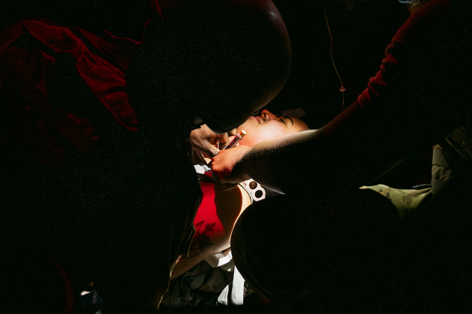 U.S. Airmen, assigned to the 99th Medical Group, perform needle decompression on a patient during the 2025 Diamondback Medic Rodeo at Nellis Air Force Base, Nevada, Dec. 9, 2025