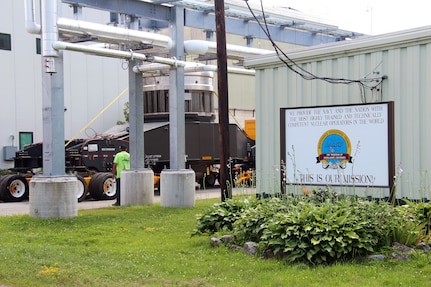 As part of the MARF Defueling Layup Availability (DLA) Project at the Kenneth A. Kesselring Site (KSO), West Milton, New York, Norfolk Naval Shipyard workers, Lucia Specialized Hauling of VA, Inc., New York State Police and other agencies partnered to transport a loaded spent fuel shipping container which will be sent to Idaho National Laboratory, Idaho Falls, Idaho for extensive testing.