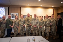 Participants and judges of the 2026 Connecticut National Guard Innovation Challenge pose for a photo inside the Governor William A. O'Neill State Armory, Hartford, Connecticut, Jan. 10, 2026.