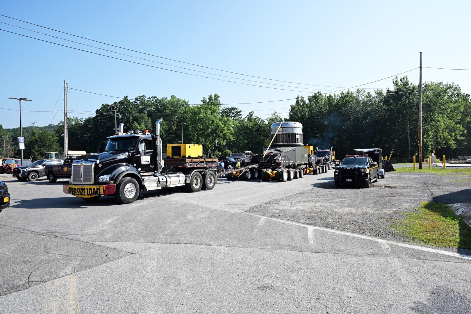 As part of the MARF Defueling Layup Availability (DLA) Project at the Kenneth A. Kesselring Site (KSO), West Milton, New York, Norfolk Naval Shipyard workers, Lucia Specialized Hauling of VA, Inc., New York State Police and other agencies partnered to transport a loaded spent fuel shipping container which will be sent to Idaho National Laboratory, Idaho Falls, Idaho for extensive testing.