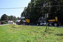 As part of the MARF Defueling Layup Availability (DLA) Project at the Kenneth A. Kesselring Site (KSO), West Milton, New York, Norfolk Naval Shipyard workers, Lucia Specialized Hauling of VA, Inc., New York State Police and other agencies partnered to transport a loaded spent fuel shipping container which will be sent to Idaho National Laboratory, Idaho Falls, Idaho for extensive testing.