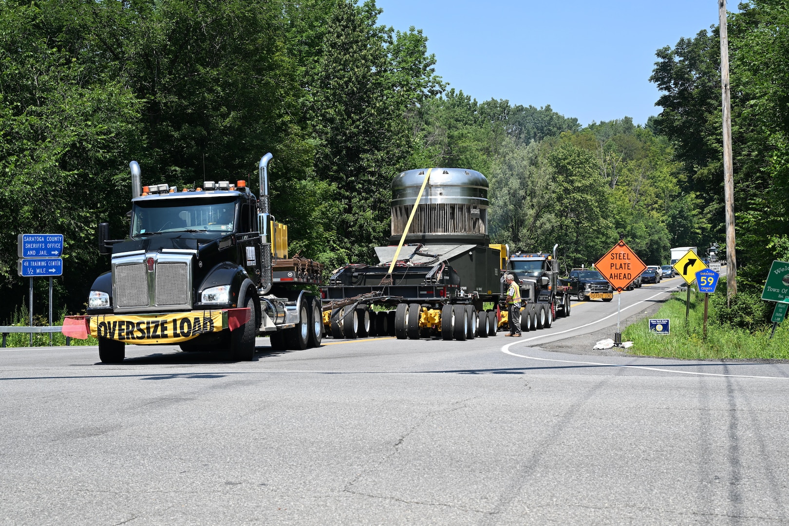 As part of the MARF Defueling Layup Availability (DLA) Project at the Kenneth A. Kesselring Site (KSO), West Milton, New York, Norfolk Naval Shipyard workers, Lucia Specialized Hauling of VA, Inc., New York State Police and other agencies partnered to transport a loaded spent fuel shipping container which will be sent to Idaho National Laboratory, Idaho Falls, Idaho for extensive testing.
